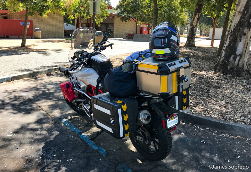 Reality of long-distance riding: bathrooms and rest stops. It was ~100°F in Northern CA. 